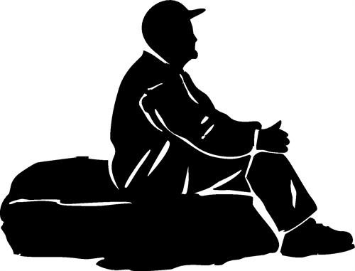 Man Sitting on Rock
